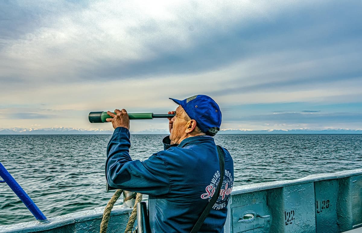 A telescope pointing towards the horizon, symbolizing future insights